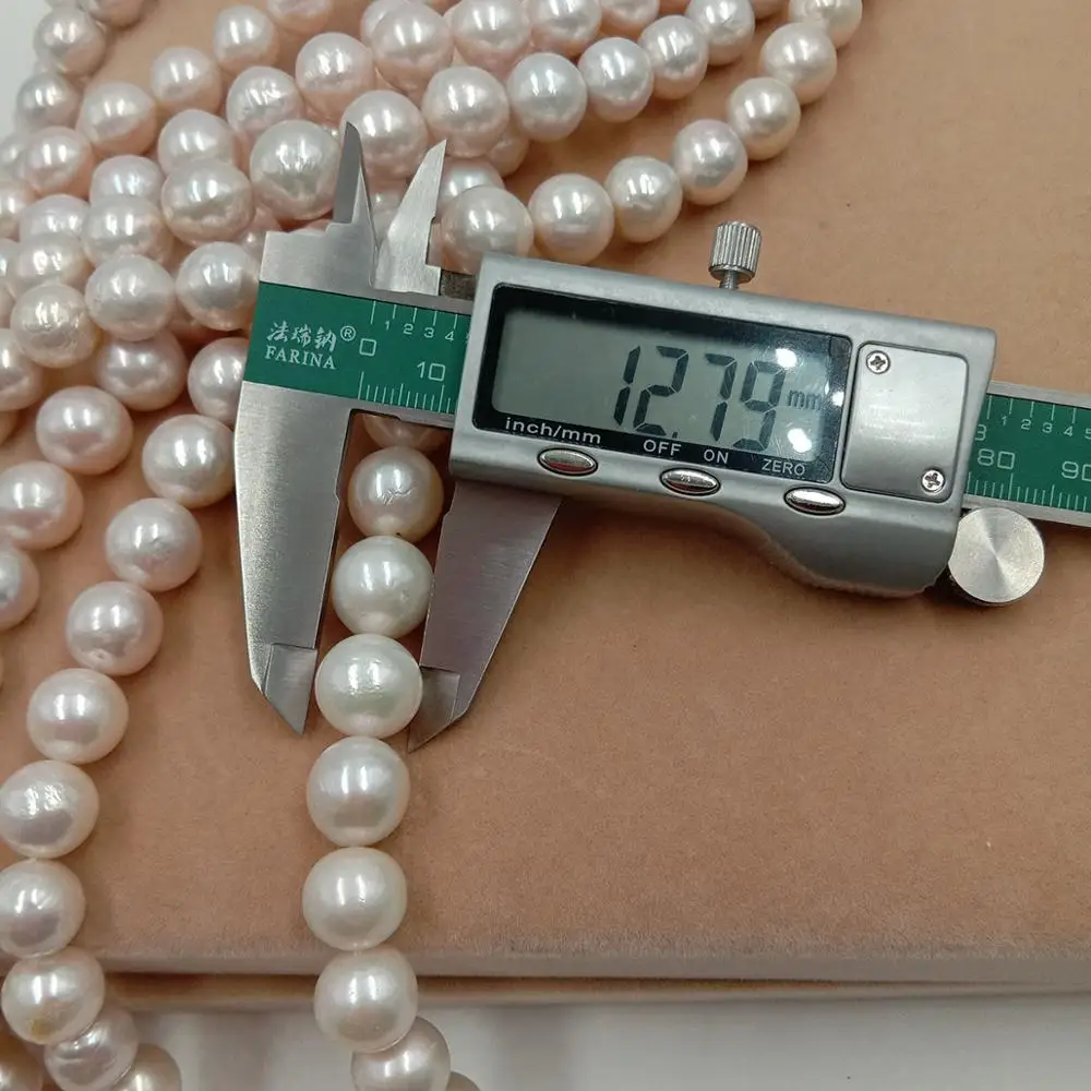 16 colių ,10-13mm balta didelis apvalus gamtos gėlavandenių perlų , natūralūs gėlo vandens prarasti pearl apvalios, aukštos blizgesys iš kryptis