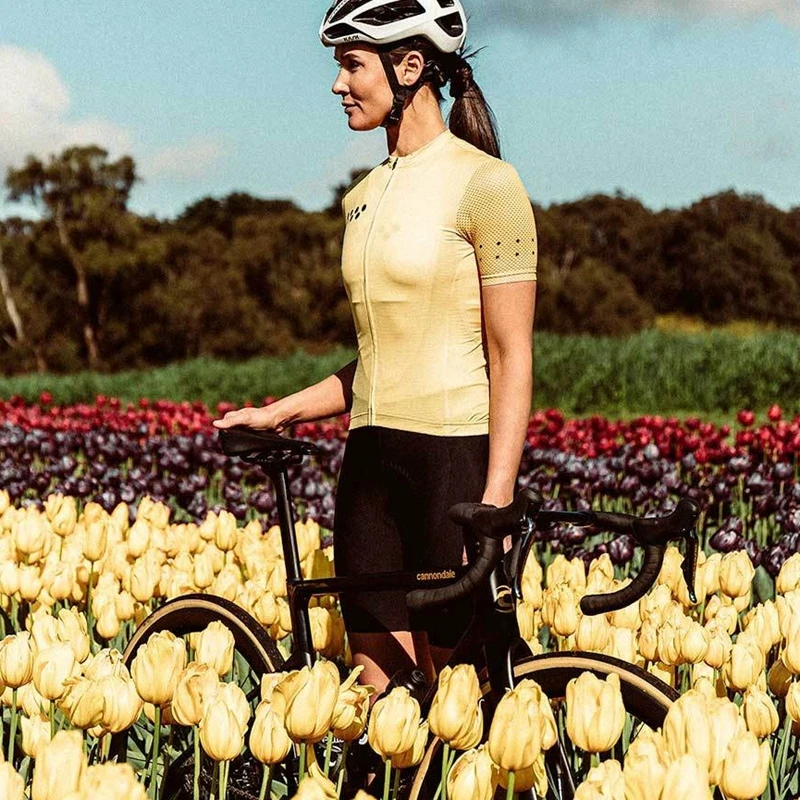 Komanda pedla dviračių kostiumas moterims Oro mesh rankovėmis trumpojo ciklo džersio ir juoda gelio pagalvėlę, šortai, kombinezonai su antkrūtiniais Spalvinga vaivorykštė spalvų serija