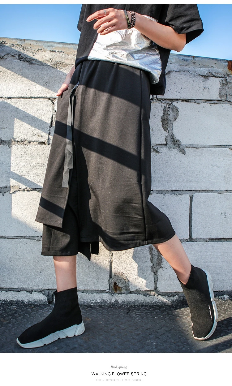 Nereguliarus moterų streetwear sijonas juodas prarasti elastinga juosmens faldas moterų mados juostelės vasaros sijonai jupe femme